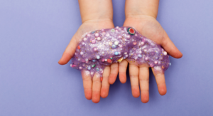 kid hands covered in slime